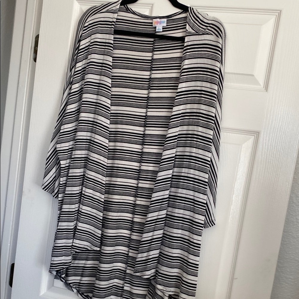 Like new LuLaRoe Lindsay Striped Black and White Open Cardigan